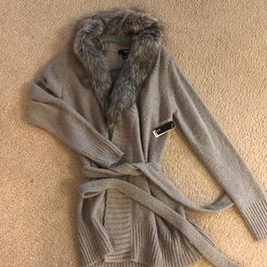 Long sweater with faux fur detail